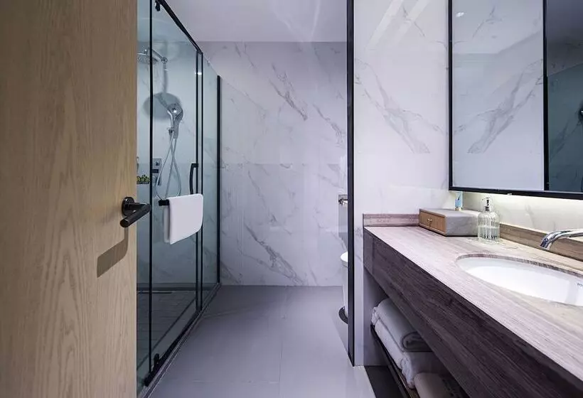 ホテル Kunyixingguangjiudian