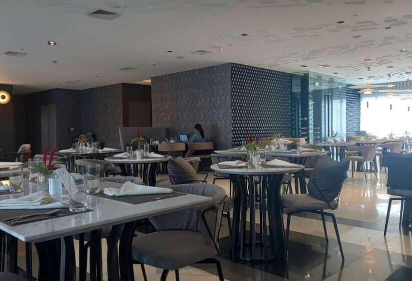 Capital O 950 Acqua Novotel Tower