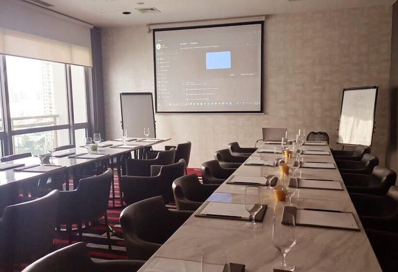 Capital O 950 Acqua Novotel Tower