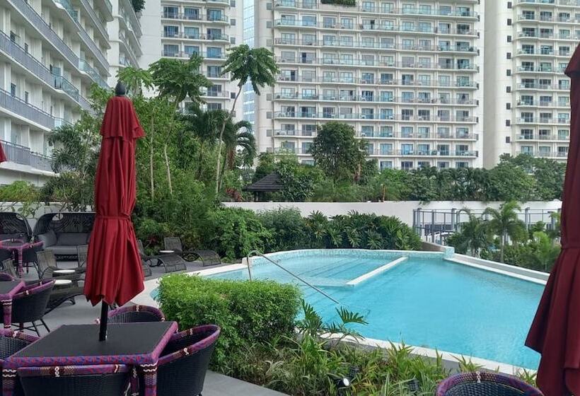 Capital O 950 Acqua Novotel Tower