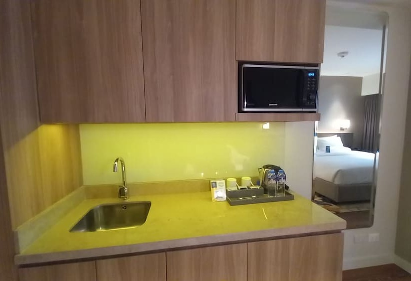 Capital O 950 Acqua Novotel Tower