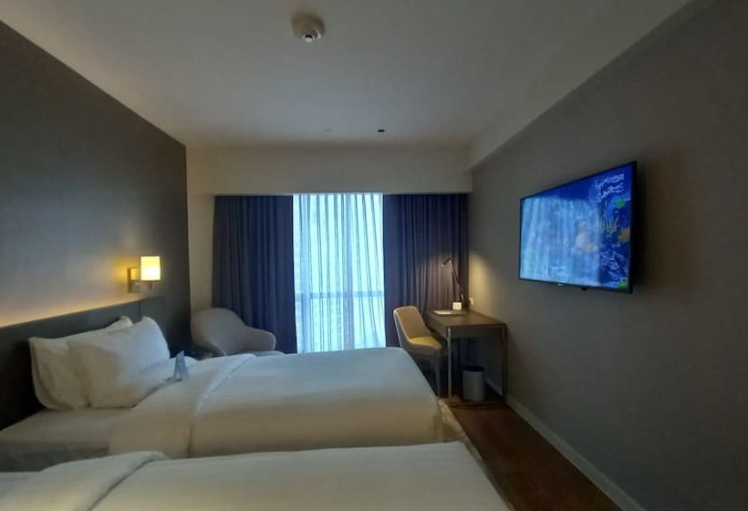 Capital O 950 Acqua Novotel Tower