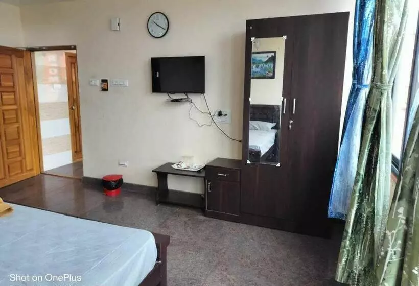 ホテル Oyo Flagship Vishu Property