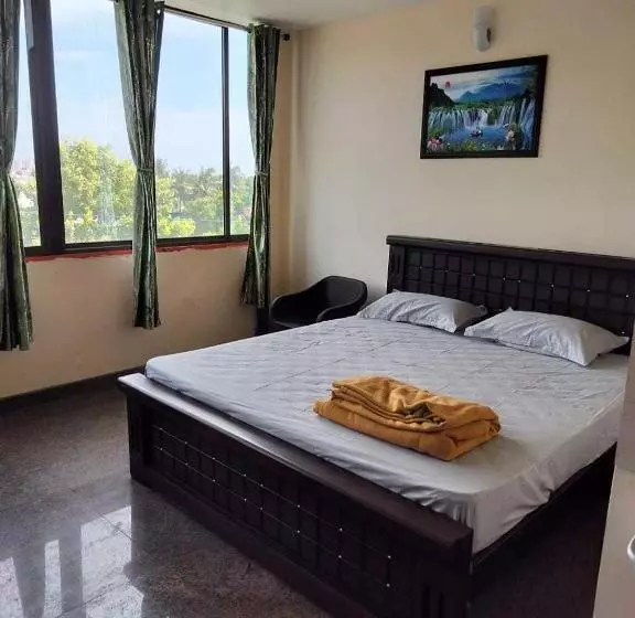 ホテル Oyo Flagship Vishu Property