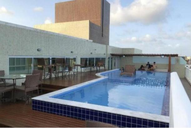 Confortável Flat Com Piscina De Borda Infinita Na Cobertura