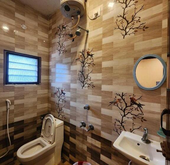 בית מלון כפרי Oyo Flagship Gk Lodge