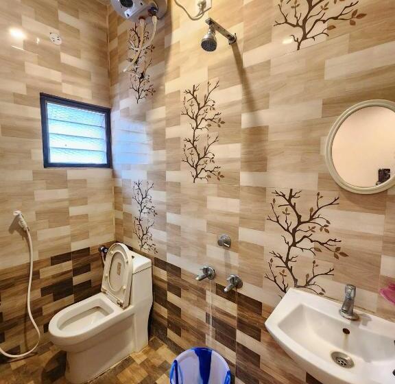 בית מלון כפרי Oyo Flagship Gk Lodge