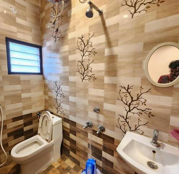 בית מלון כפרי Oyo Flagship Gk Lodge