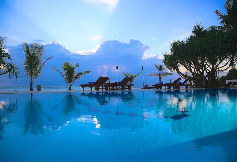 Отель Whispering Palms