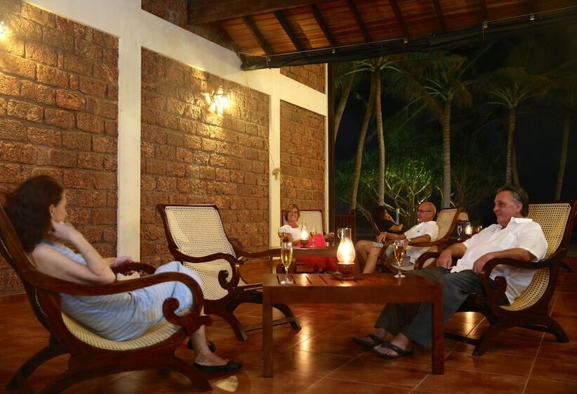 Отель Whispering Palms