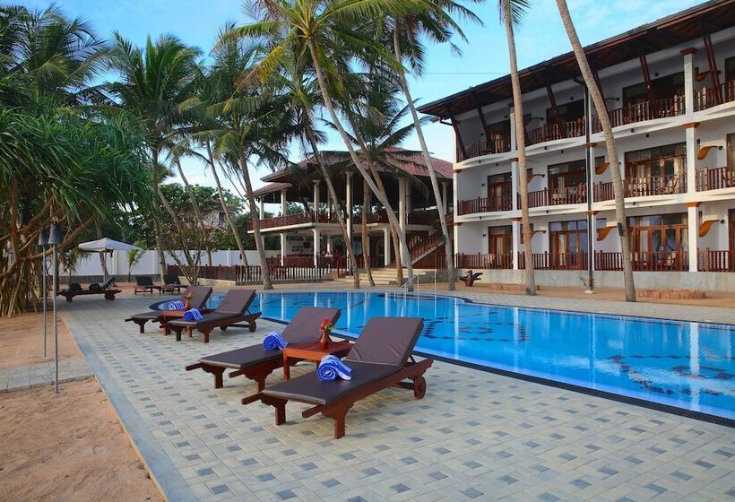 Отель Whispering Palms