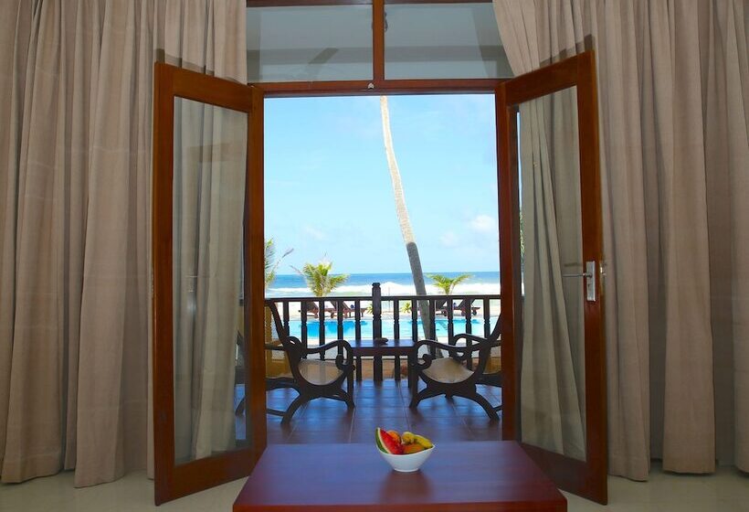 Отель Whispering Palms