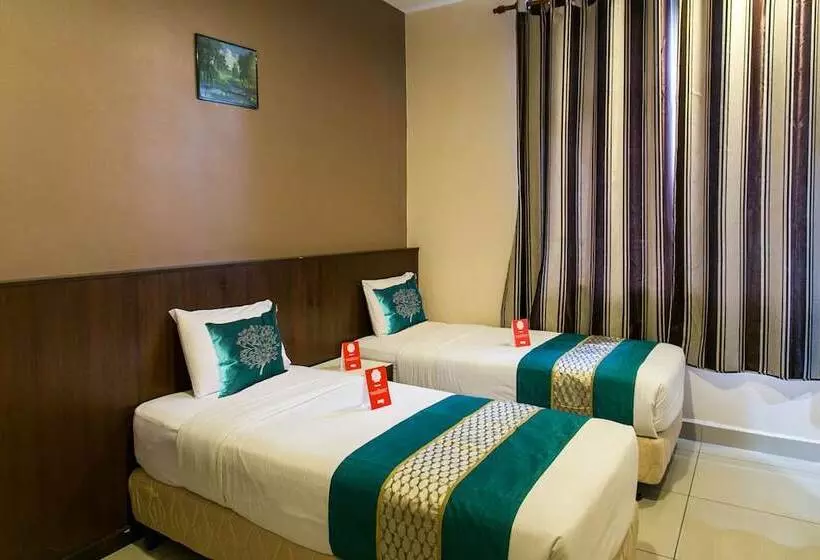 ホテル Capital O 91017 Tuba Beach Resort @ Pulau Tuba