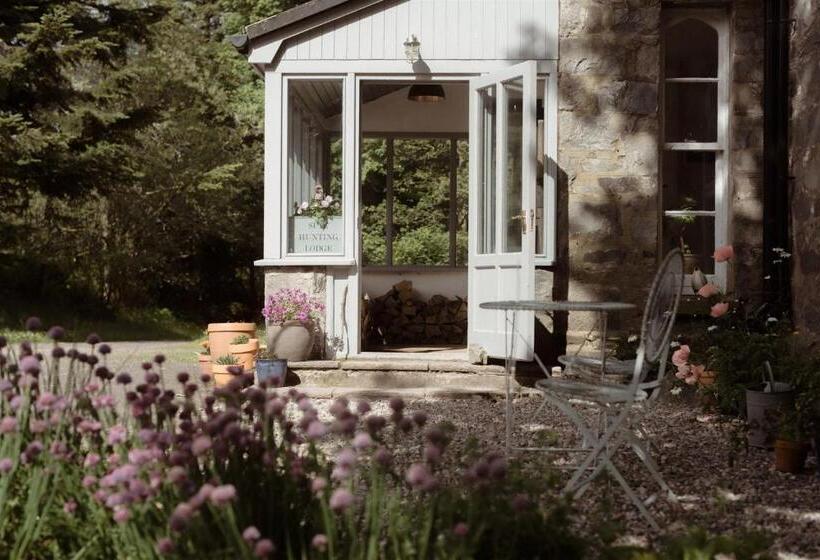 Отель Suie Hunting Lodge