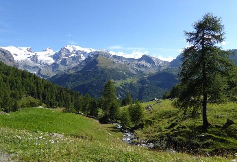 فندق Family Apartments Le Chalet