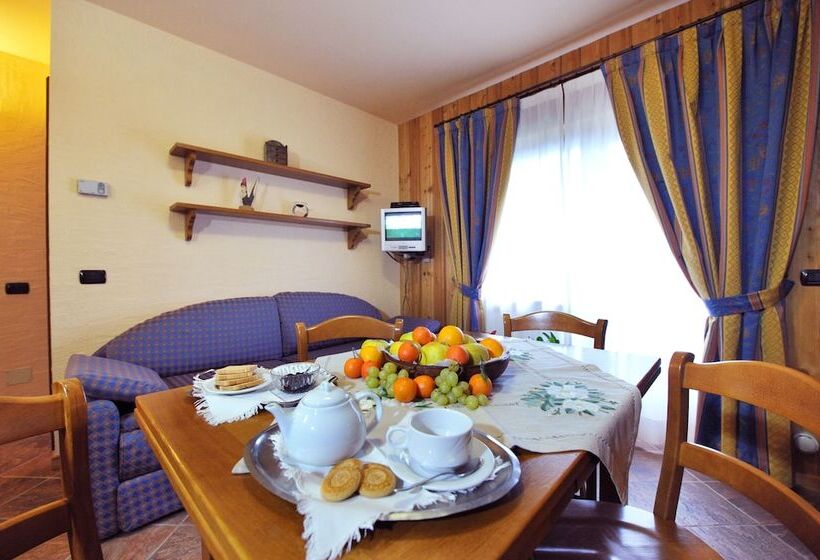 فندق Family Apartments Le Chalet