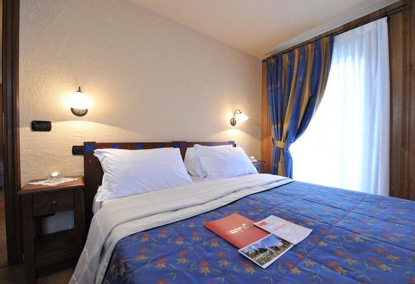 فندق Family Apartments Le Chalet