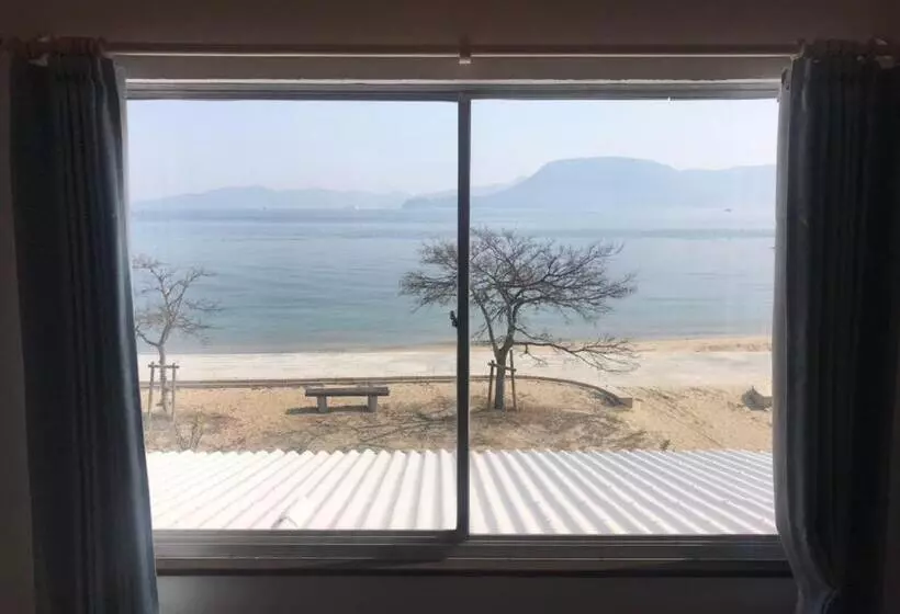 ペンション Megijima Island Guesthouse & Cafe Megino