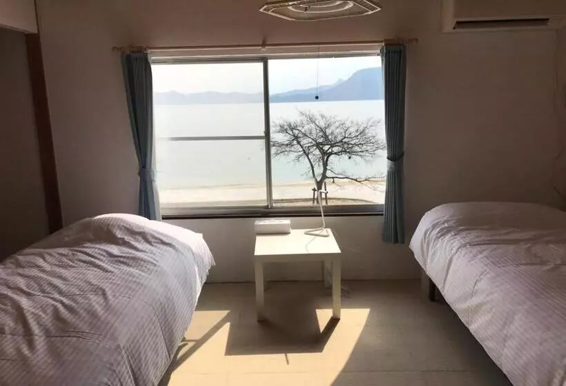 ペンション Megijima Island Guesthouse & Cafe Megino