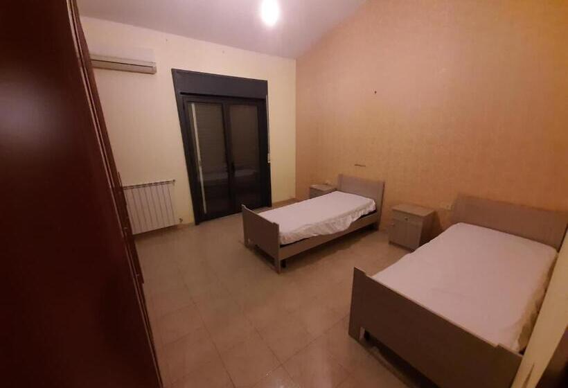 פנסיון Cat Shouse