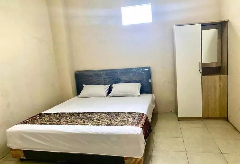 Hotelli Oyo 93838 Delia Inn Syariah