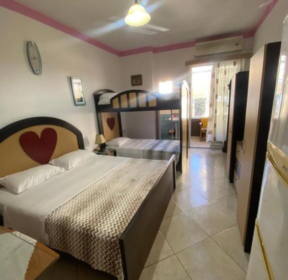 ホテル Cozy Inn Apartments