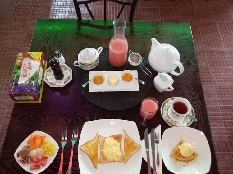 مبيت وإفطار Palms Villa