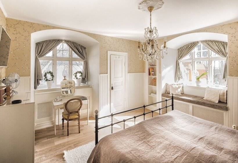 تختخواب و صبحانه Kaptensvillan