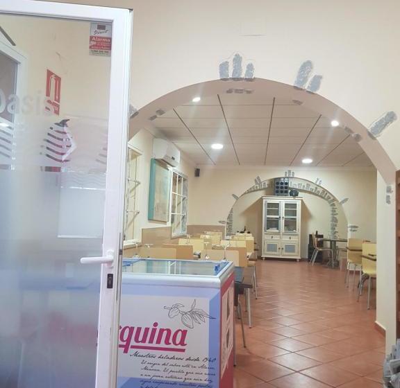 هاستل Hostal Pizzeria Oasis