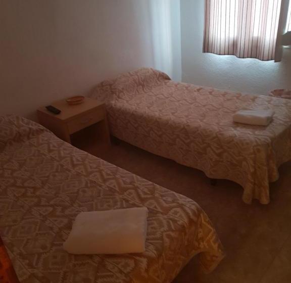 هاستل Hostal Pizzeria Oasis