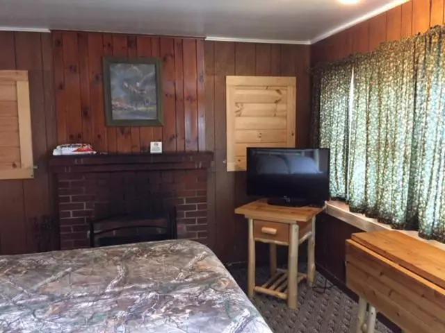 モーテル Pine Knoll Hotel Lakeside Lodge & Cabin