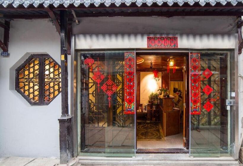 Отель The Courtyard Suzhou Inn Hemu Branch