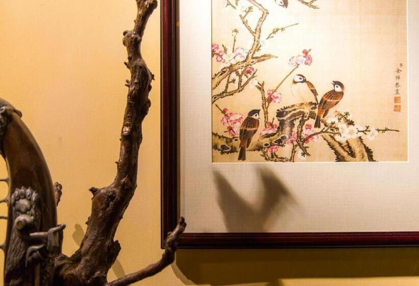 Отель The Courtyard Suzhou Inn Hemu Branch