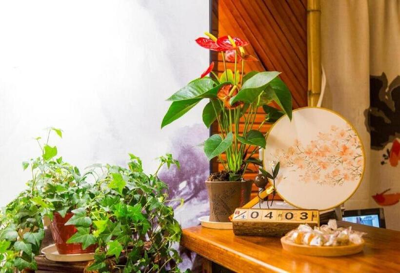 Отель The Courtyard Suzhou Inn Hemu Branch