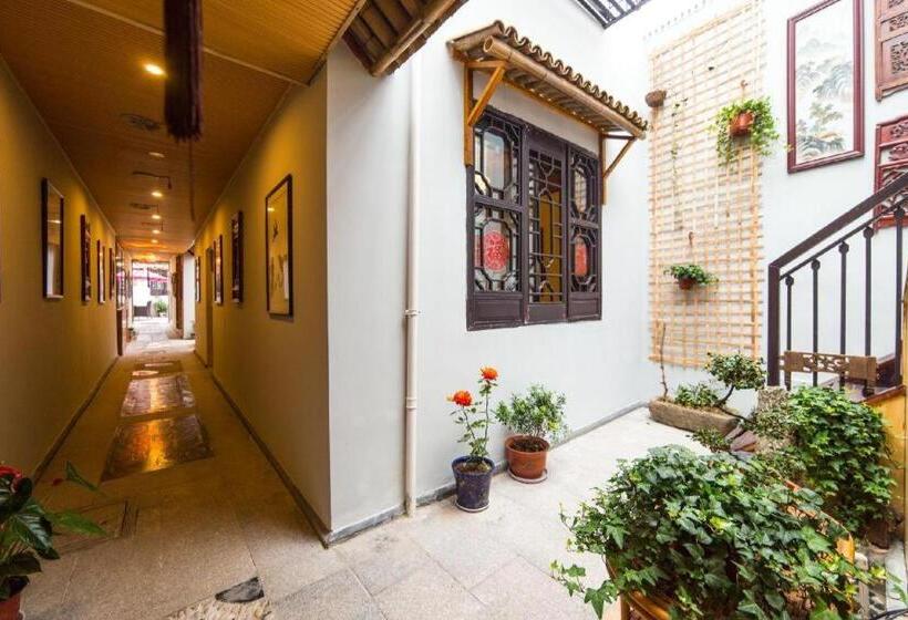 Отель The Courtyard Suzhou Inn Hemu Branch