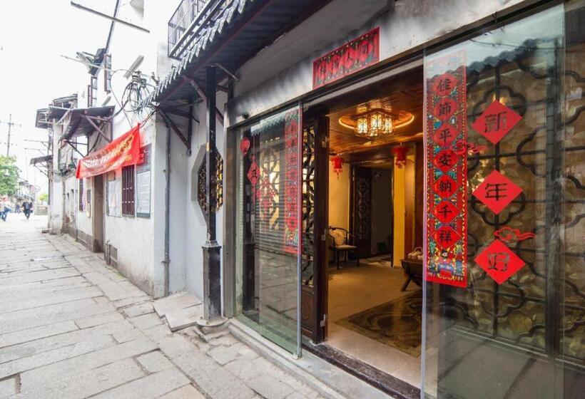 Отель The Courtyard Suzhou Inn Hemu Branch