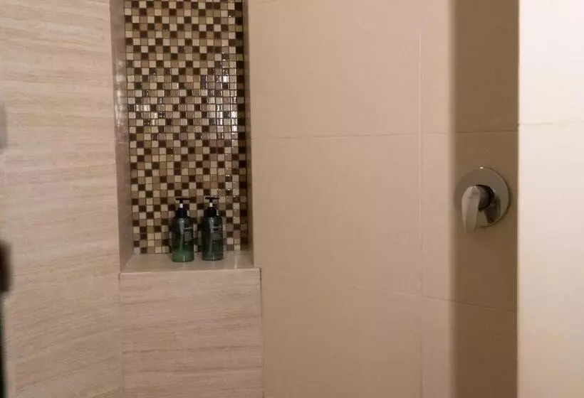Infinity Suites Habitación Triple 212