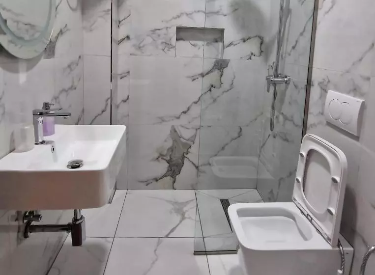 تختخواب و صبحانه Coral Beach Apartment