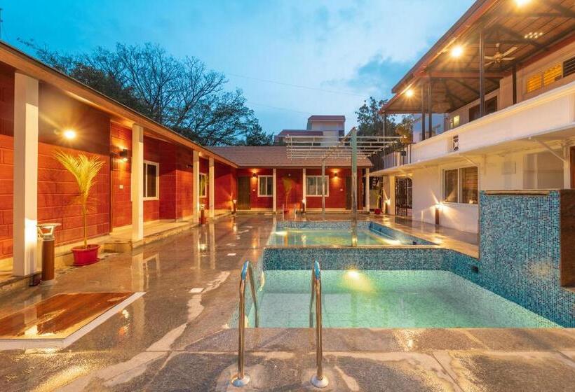 בית מלון כפרי Seasons Suites Hbr