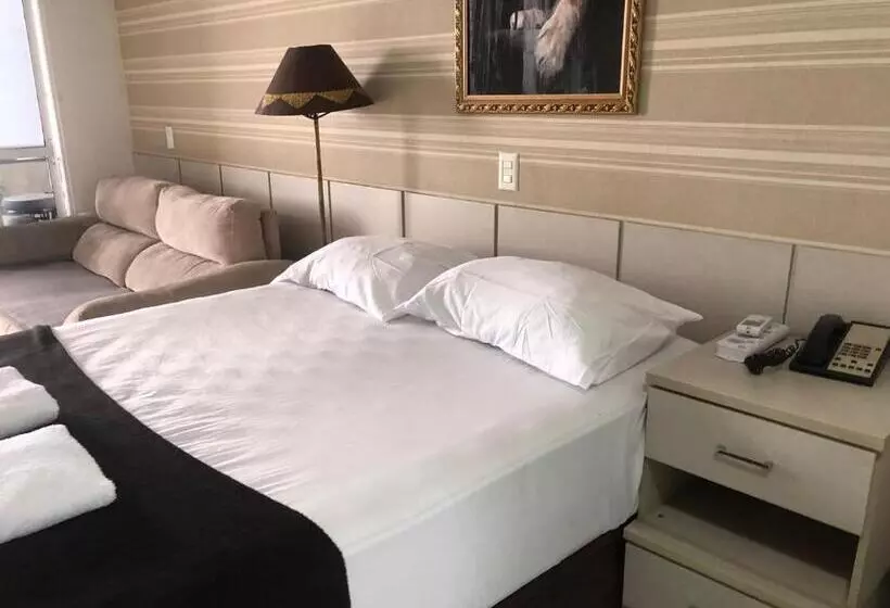 Flat Hotel Morador 1110 Suíte,sofá,varanda,cozinha