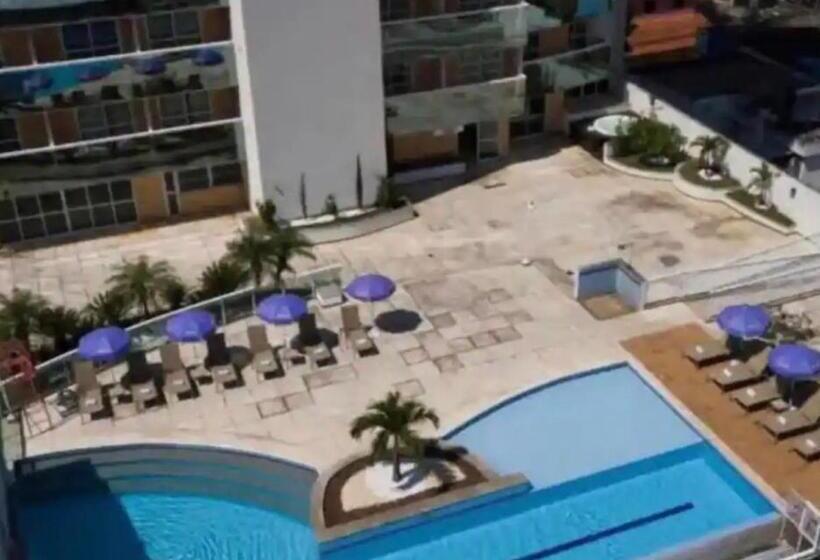 Flat Hotel Morador 1110 Suíte,sofá,varanda,cozinha