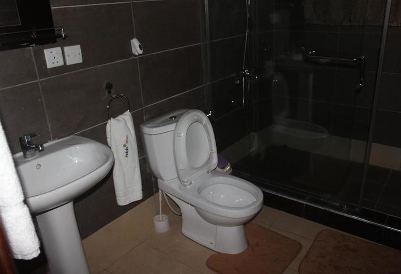 호텔 Oguaa Apartments & Lodging