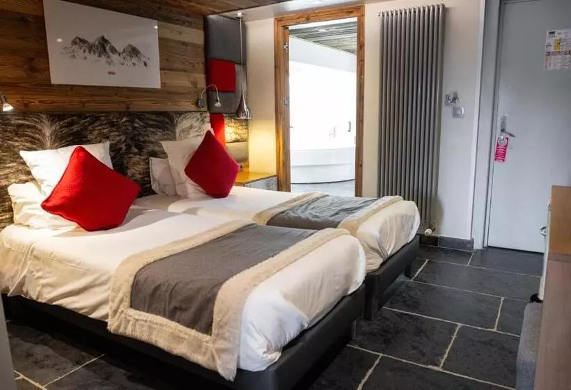 Hotelli Hôtel Alpina & Spa   Restaurant Oxalis