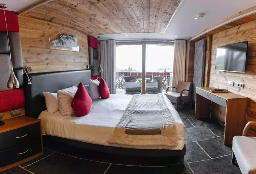 Hotelli Hôtel Alpina & Spa   Restaurant Oxalis