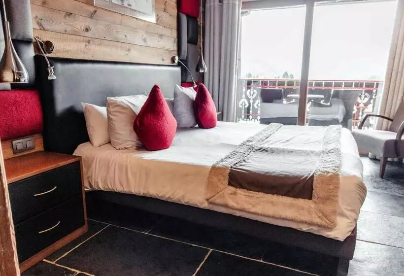 Hotelli Hôtel Alpina & Spa   Restaurant Oxalis