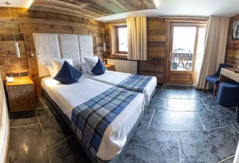 Hotelli Hôtel Alpina & Spa   Restaurant Oxalis