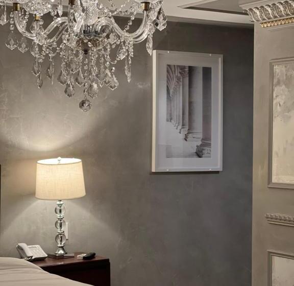 Отель Chateau Suites