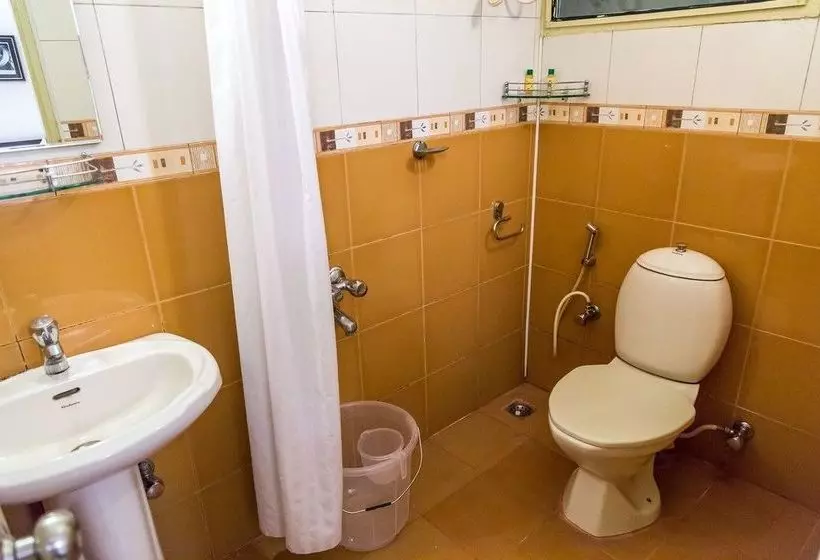 ホテル Mint Queensway Suites