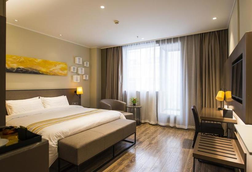 Отель Home Inn Plus Shanghai Huaihai Road Sinan Road