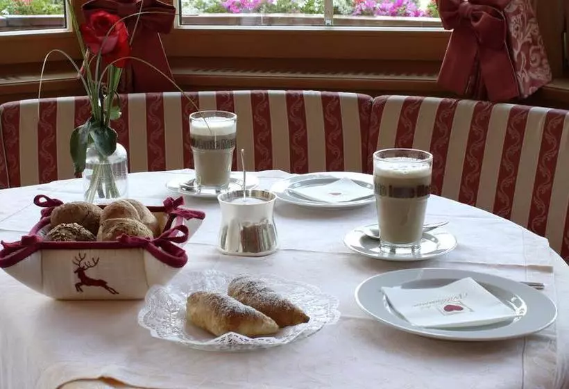 Garni Hotel Rosengarten B&b